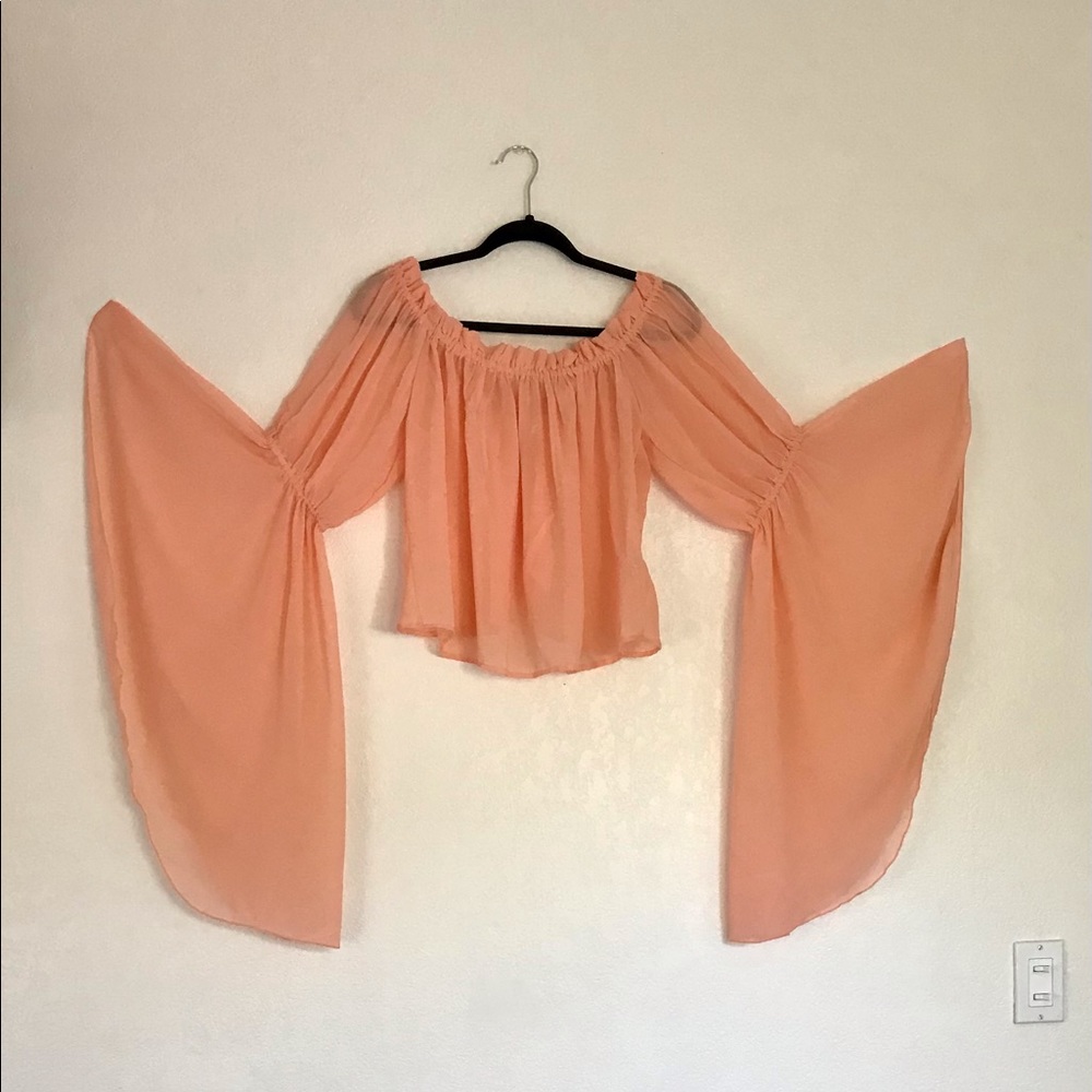 Sheer coral top with extreme bell sleeves